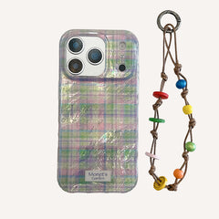 Purple and green checkered phone case with charm