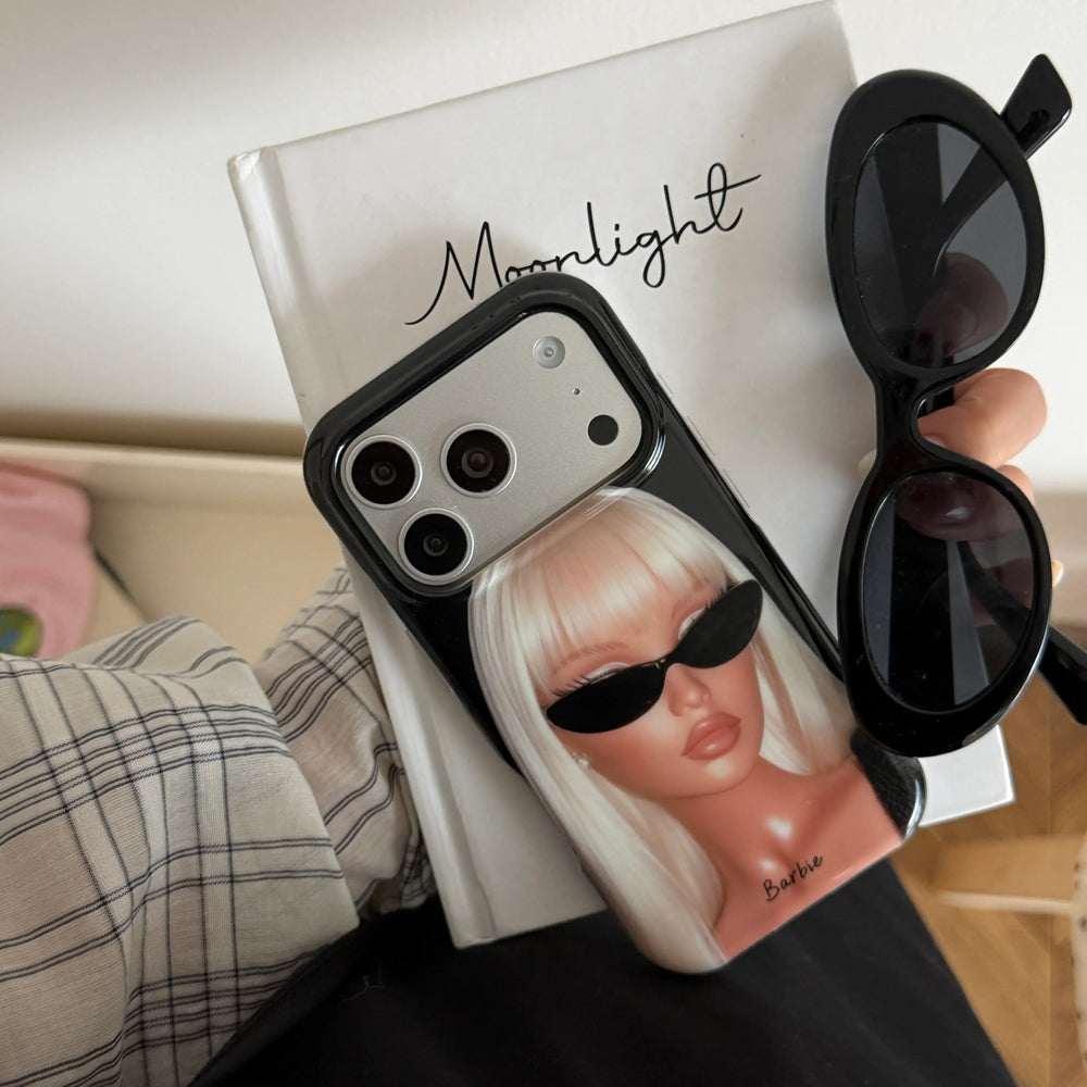 Black fashion girl iPhone case displayed beside matching sunglasses.