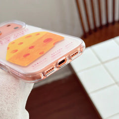 Close-up of cheese clear iPhone case charging port cutout