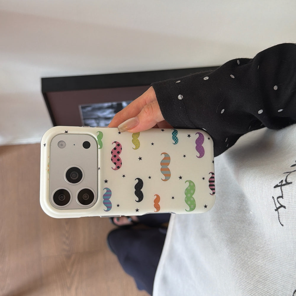 A side profile shot of a hand holding a colorful mustache iPhone case horizontally.