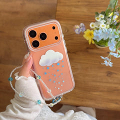The cute 3D cloud star iPhone case neatly packaged inside a blue checkered gift box with its beaded charm.
