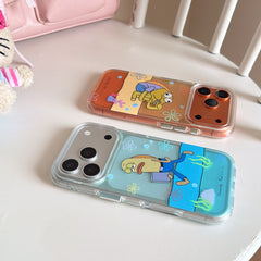 An orange and a light blue clear phone cover with funny animated fish graphics resting on a white chair.