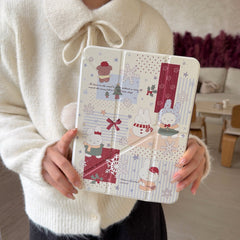A person wearing a cozy white knitted sweater holding the closed front cover of a cute winter Miffy bunny iPad case featuring soft girl aesthetic illustrations.