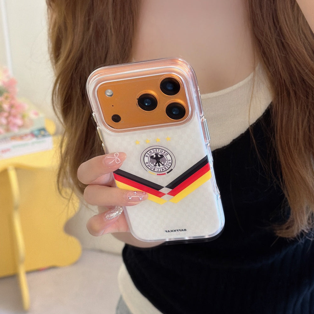 Close-up of a Germany soccer mirror phone case with a metallic orange gold camera protector ring.