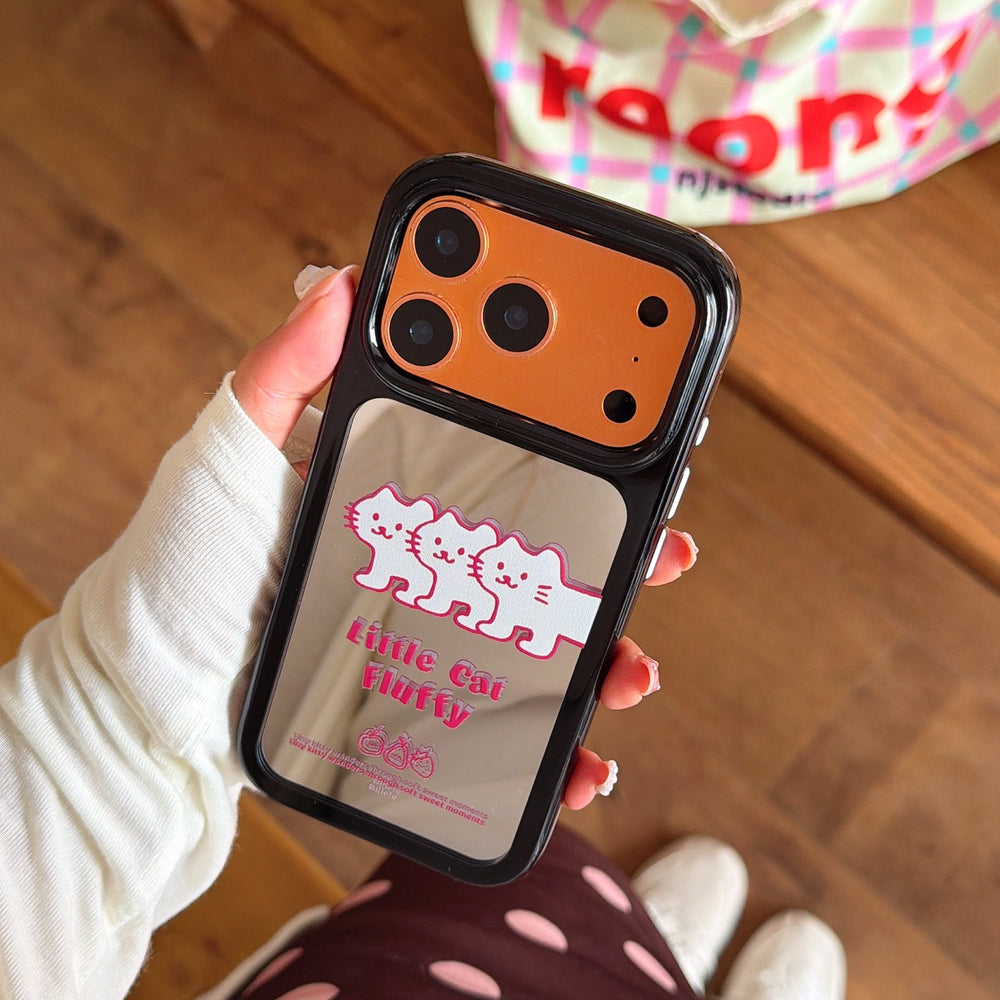 Ergonomic grip on a heavy-duty orange mirror protective phone shell with premium camera lens protection.
