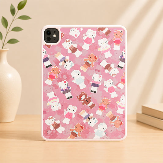 An upright studio shot of an aesthetic pink Hello Kitty iPad case standing on a light wooden table, next to a minimal white ceramic vase with green leaves and stacked books under soft warm shadow lighting.