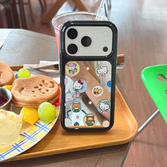 Cute kitty sticker mirror iPhone case displayed on a café table