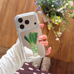 Hand holding a Korean style green leek mirror phone shell with a protective silver camera ring option.