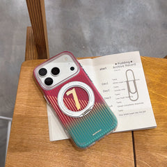 A clear phone case with a striking red to green fade and a prominent gold number 7 inside a closed magnetic ring, placed flat on a wooden surface next to a small notebook.