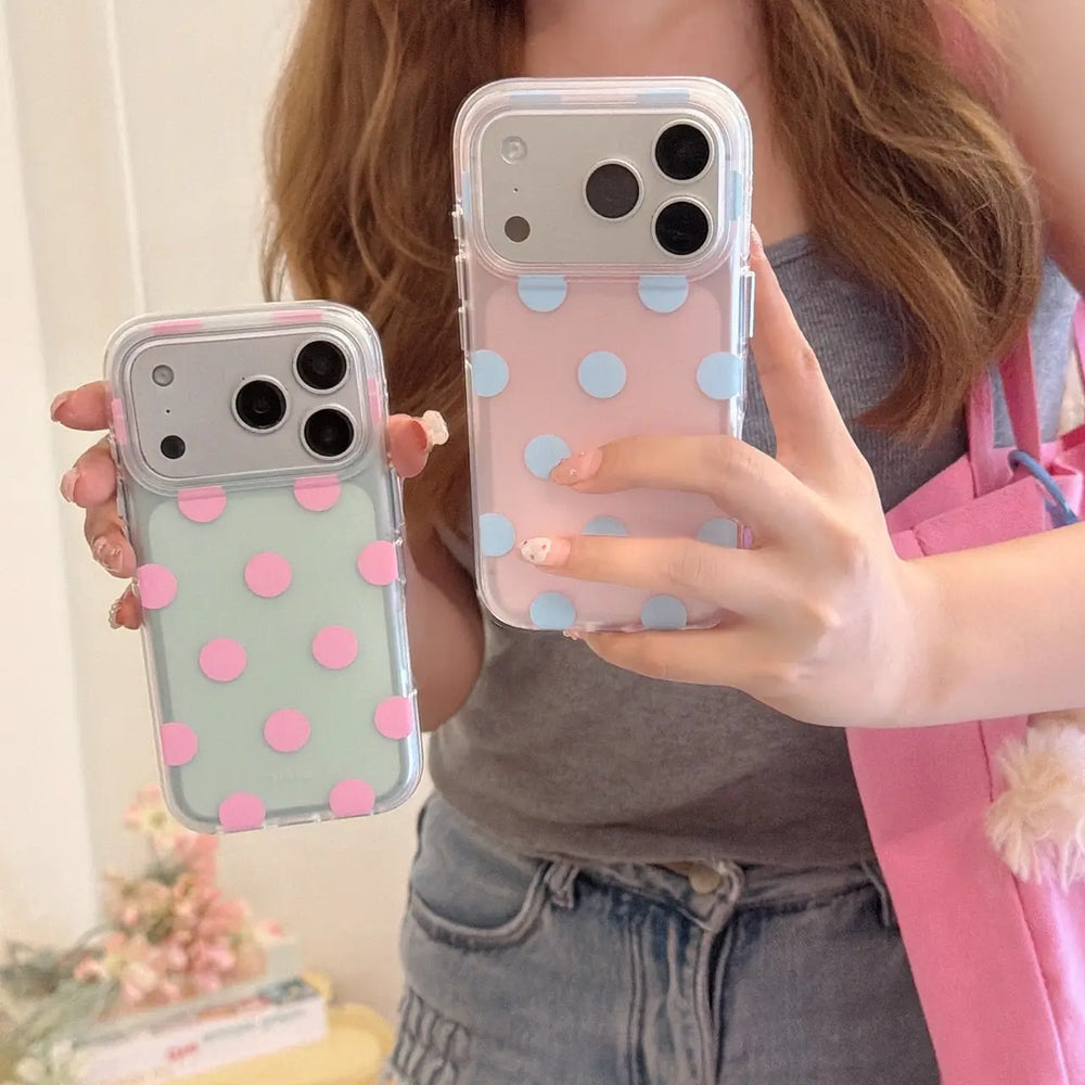 Two pastel polka dot clear iPhone cases with raised dots and clear bumper