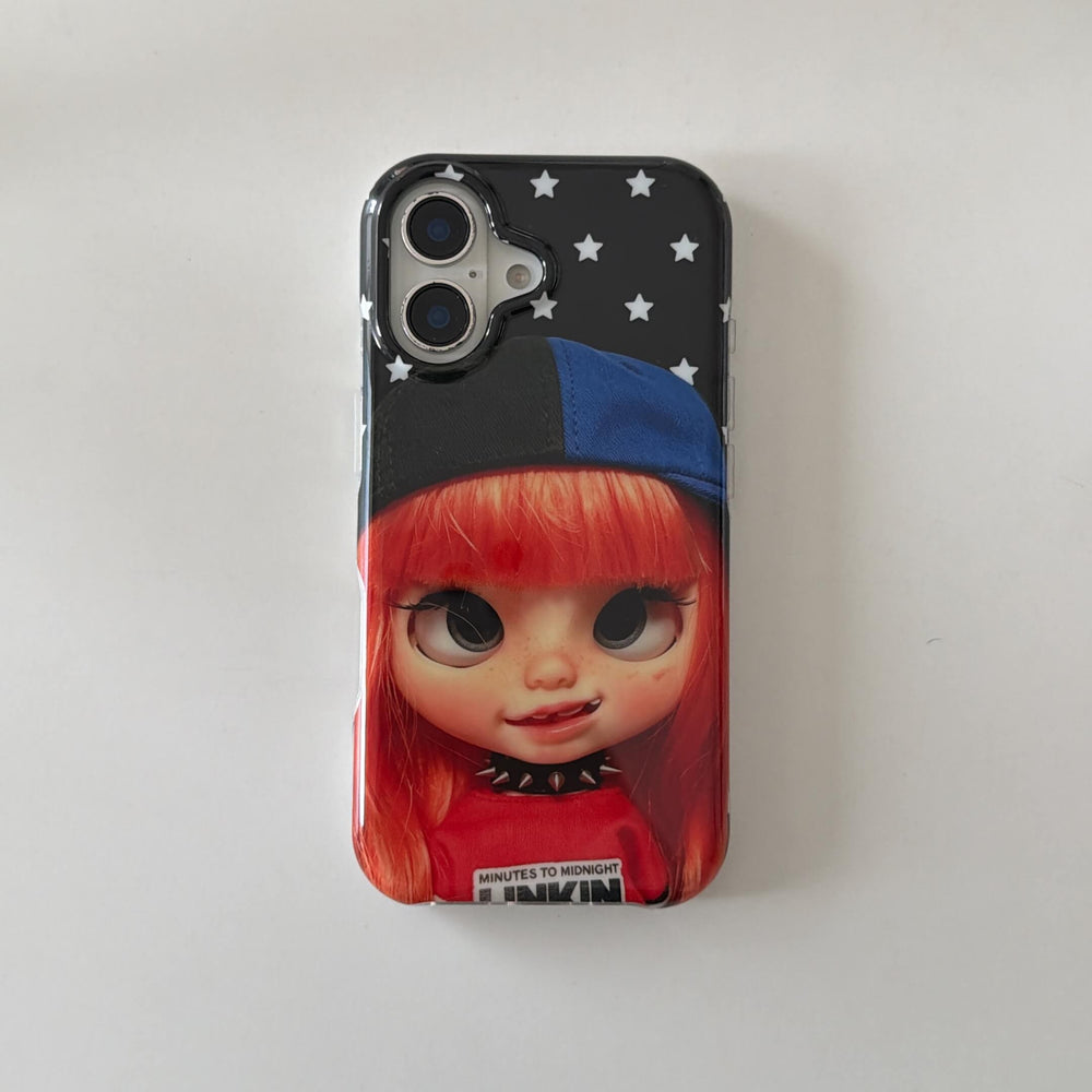 Front product view of a red-haired Y2K doll iPhone case with white stars.