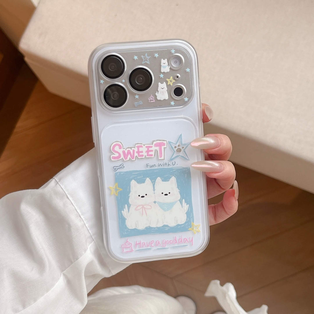Close-up of a hand holding a triple-camera kawaii dog iPhone Pro Max case with pastel star motifs.