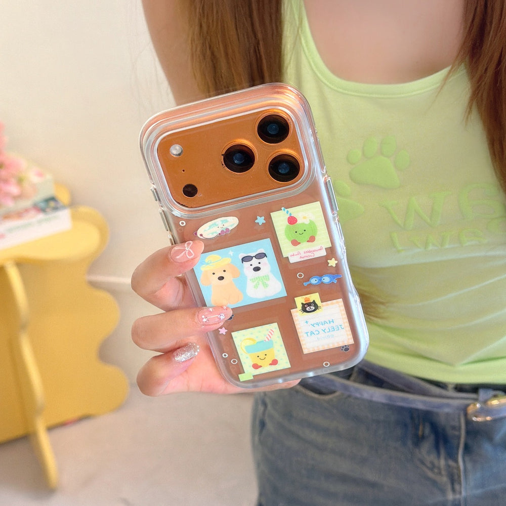 Close-up of hands holding an orange phone case decorated with retro style cartoon animal and drink stickers.