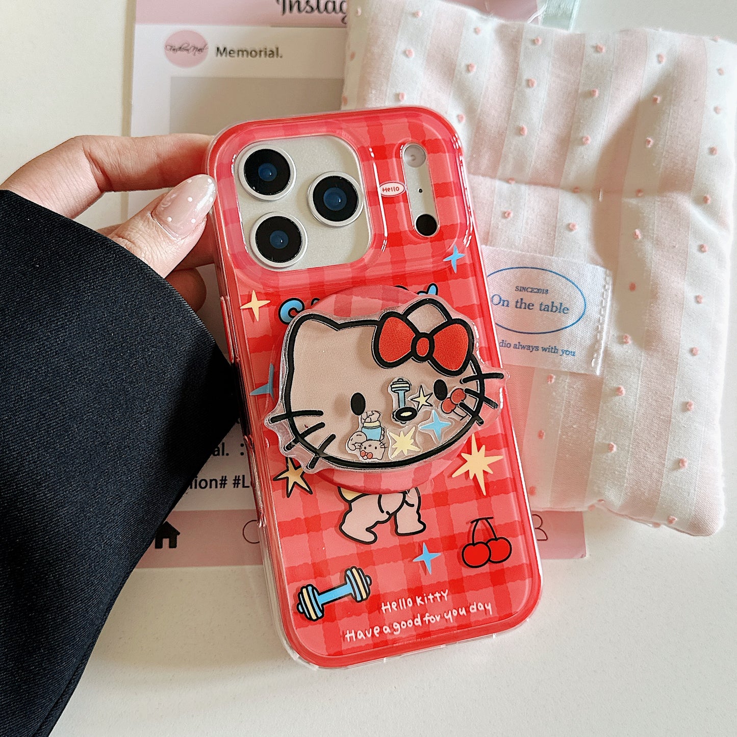 Red plaid Hercules Kitty phone case with magnetic stand