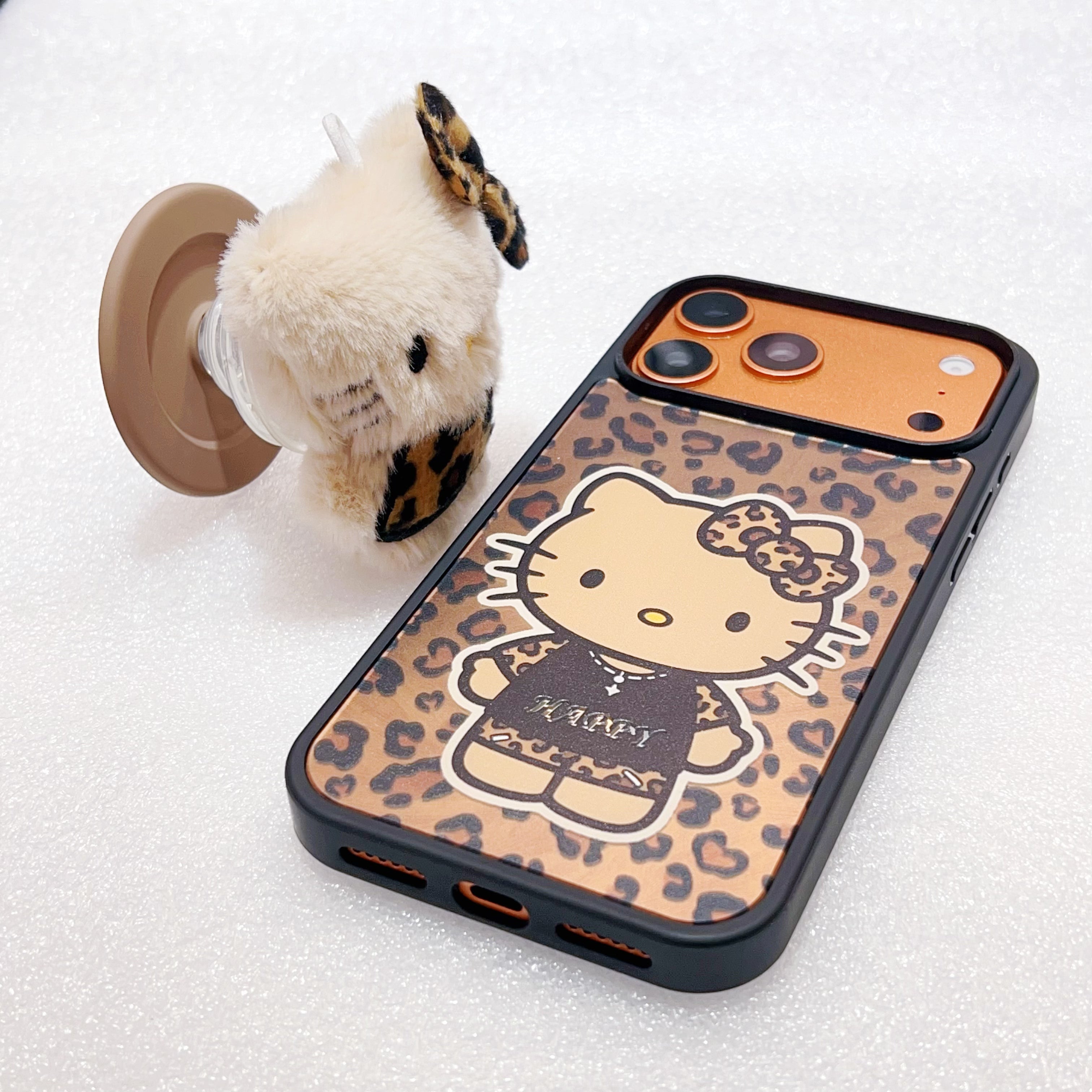 Leopard print Hello Kitty magnetic phone case for iPhone 17