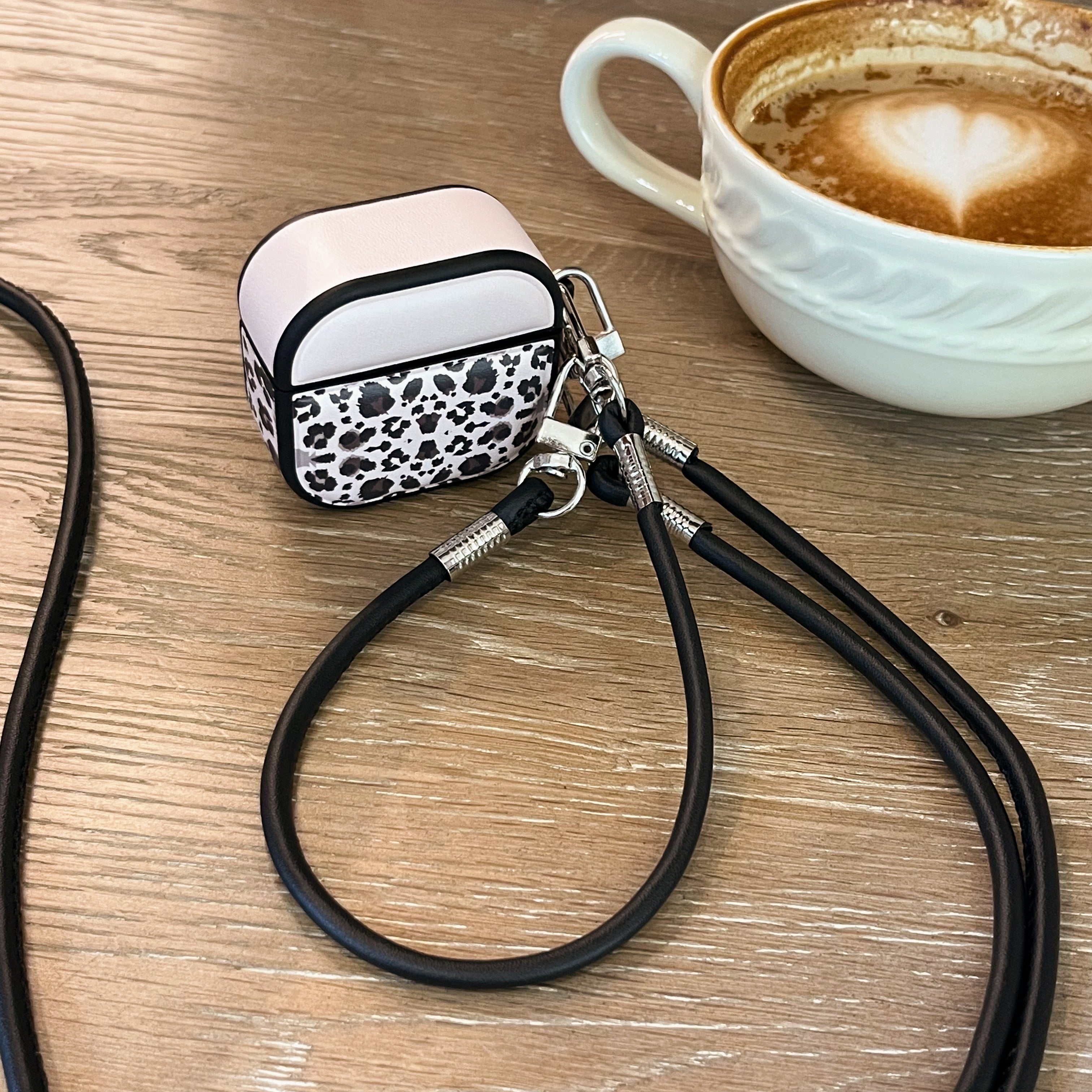 Color-blocked black leopard print magnetic drum-shaped earphone case