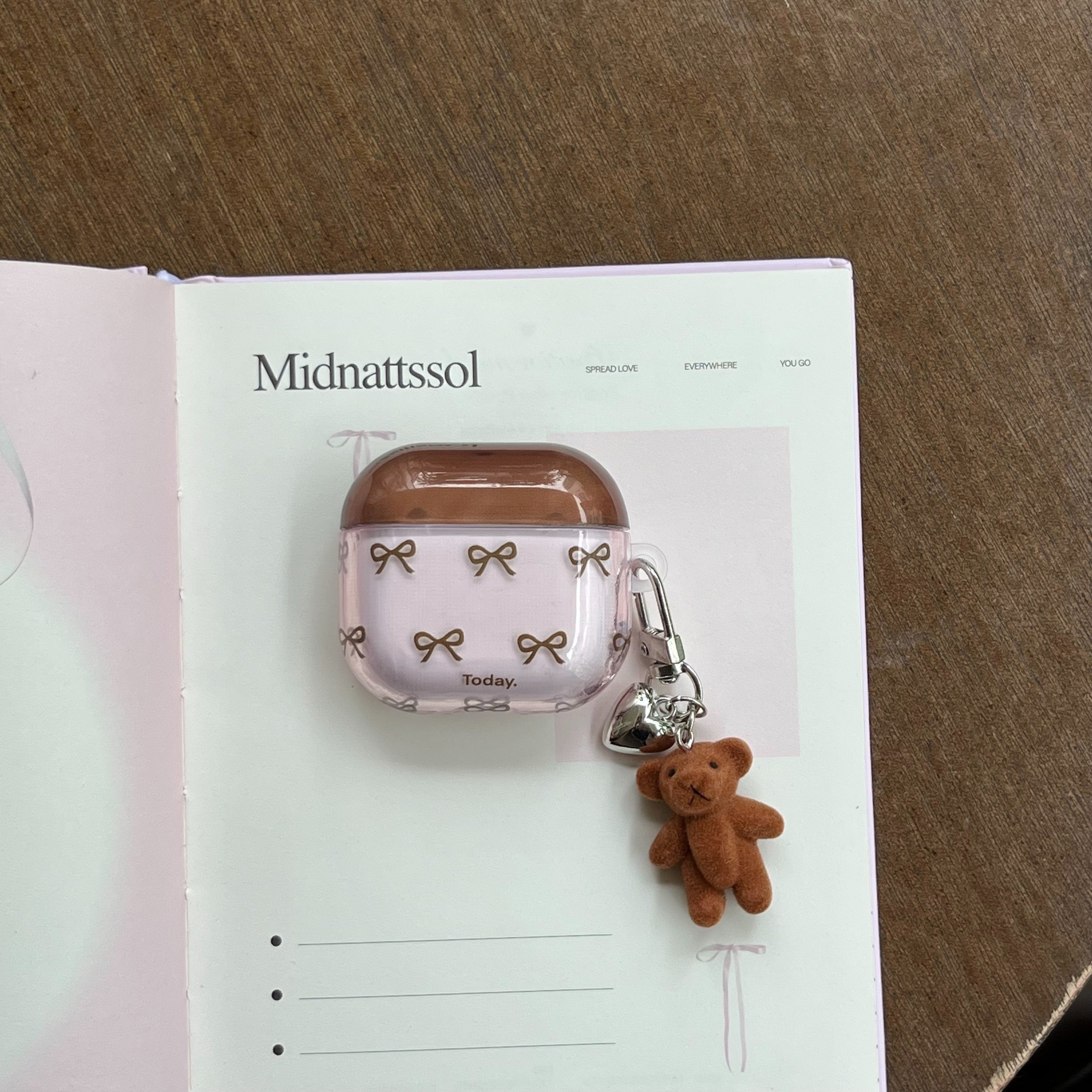 Color-blocked bow bear earphone case