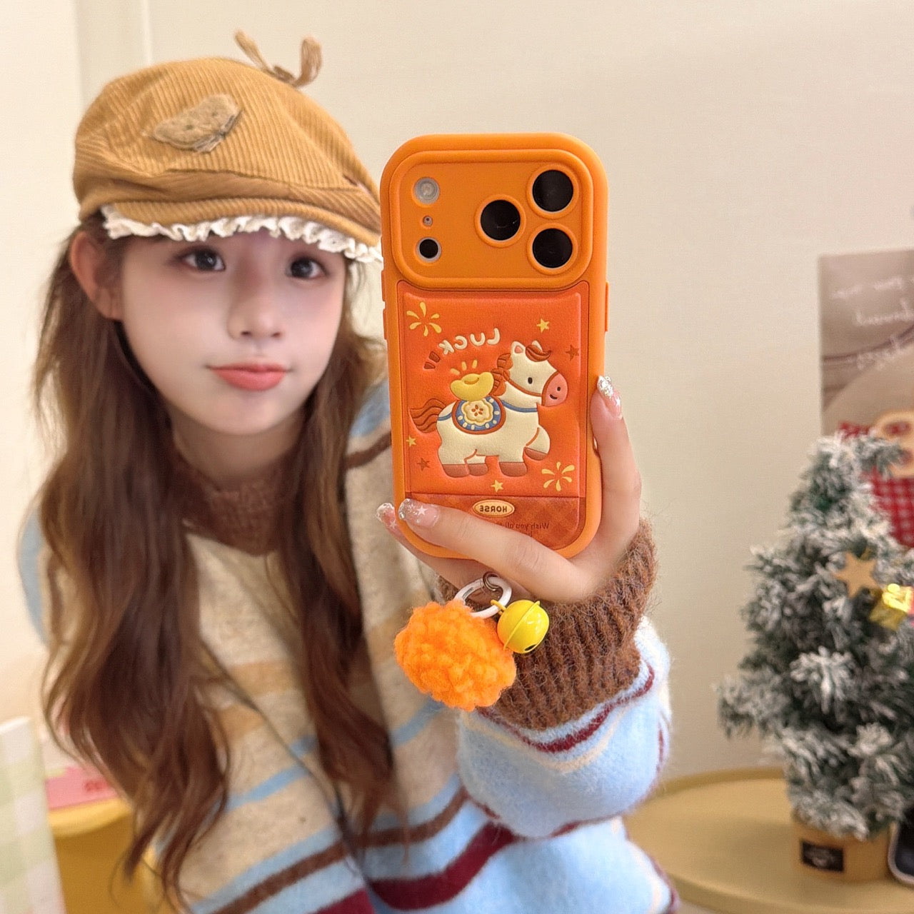 Orange-based 3D Apple phone case with gold ingot and pony design