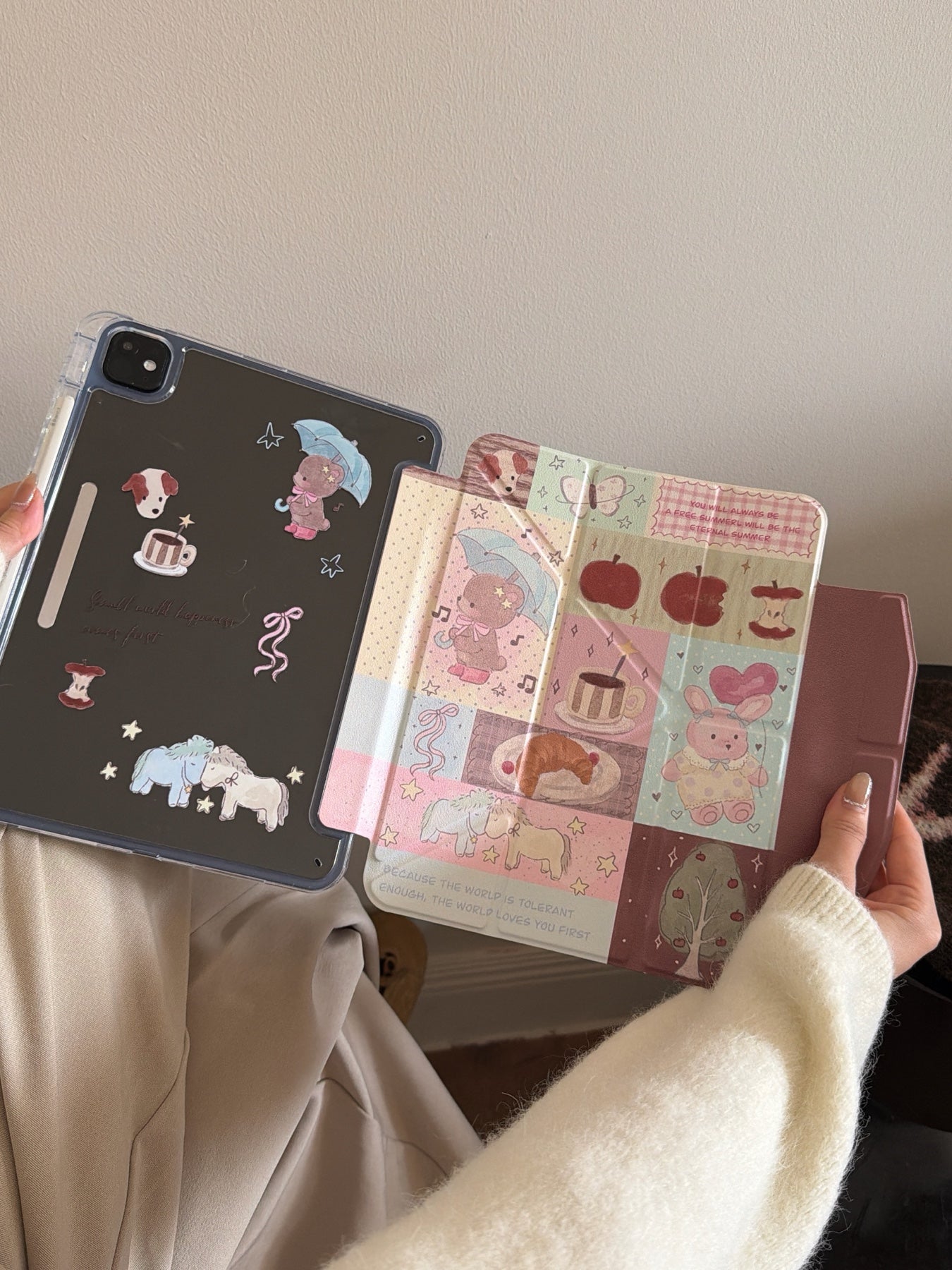 Hands separating the magnetic detachable clear back cover from the kawaii teddy bear patchwork smart folio flap.