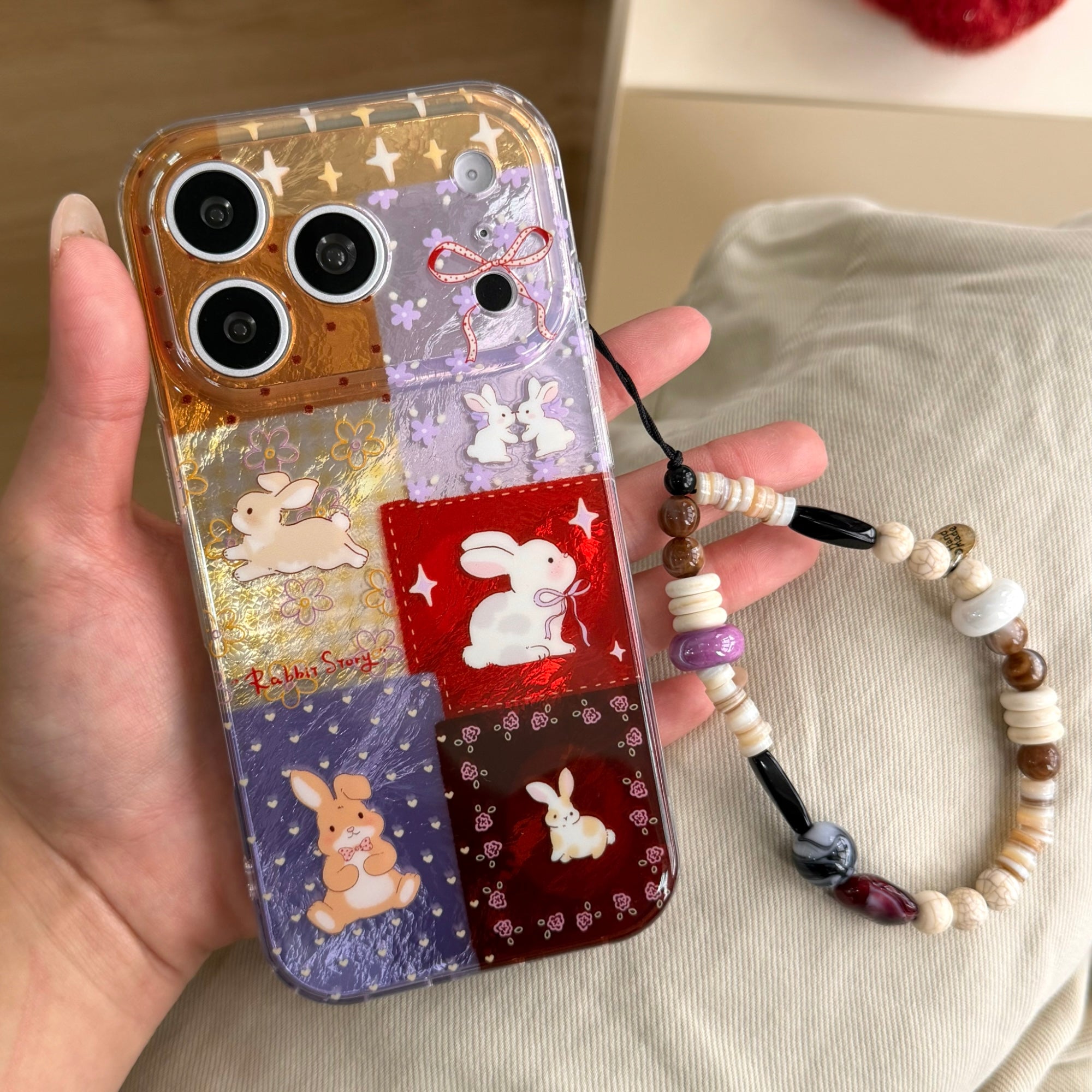 Aesthetic Red-Purple Floral Bunny Case: 360° Protective Series with Charm Wristlet Chain for iPhone 13-17 Series | Vibrant Patchwork Design