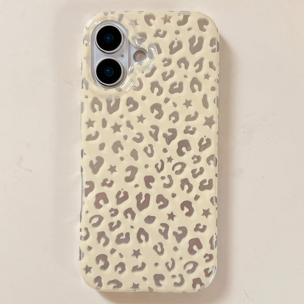 Cream beige Y2K metallic foil star leopard iPhone case with a glossy finish and wavy camera border.