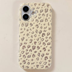 Cream beige Y2K metallic foil star leopard iPhone case with a glossy finish and wavy camera border.