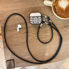 Color-blocked black leopard print magnetic drum-shaped earphone case