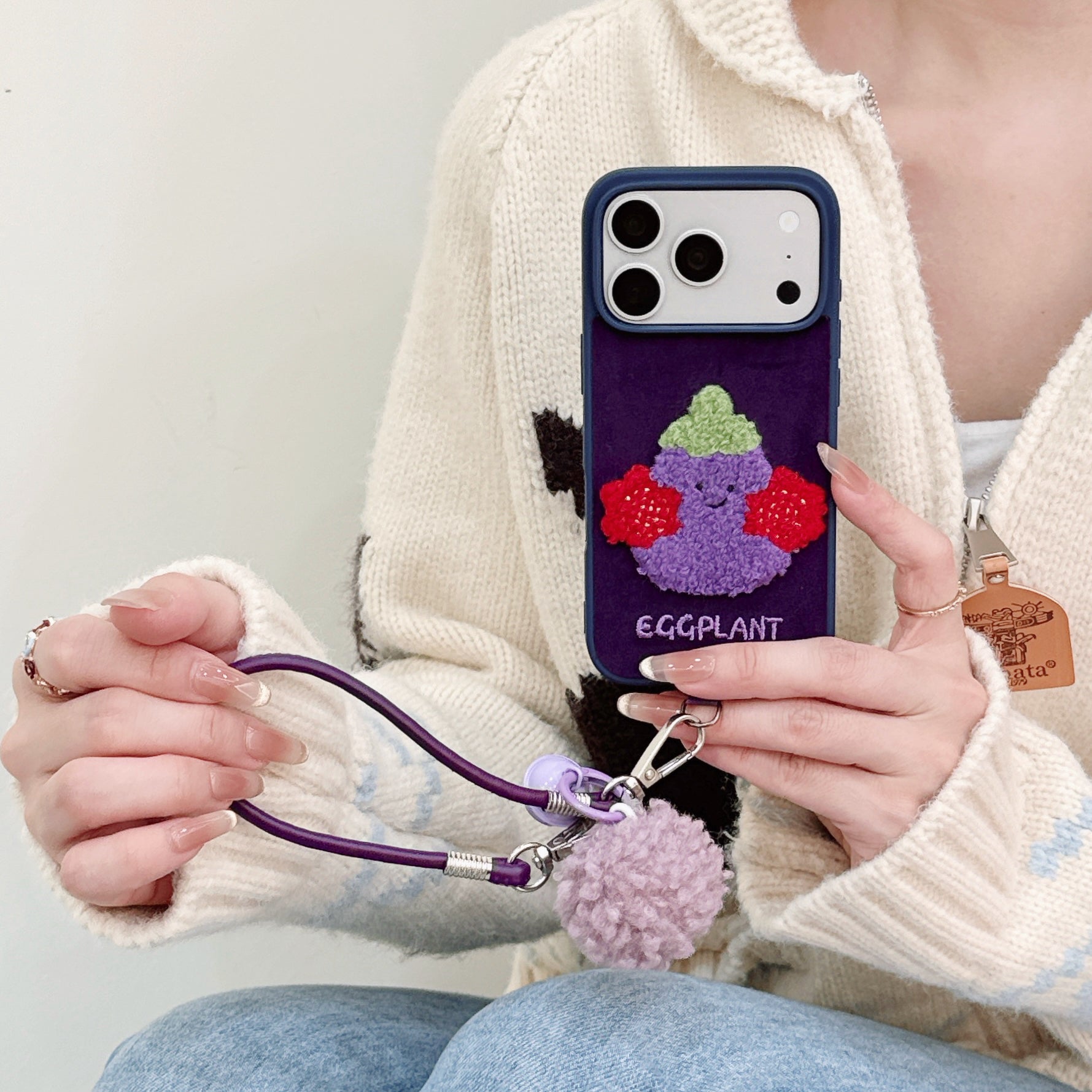 Embroidered Jellyca smiley eggplant phone case