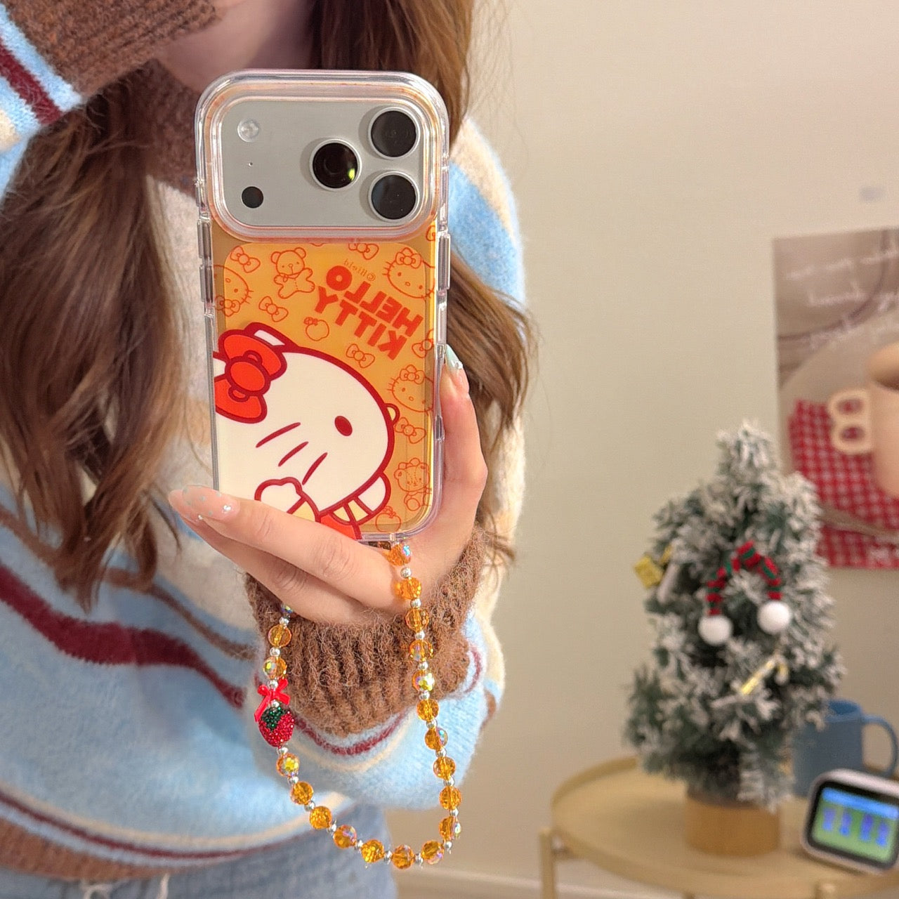 Orange-toned Kitty side profile rounded airbag phone case