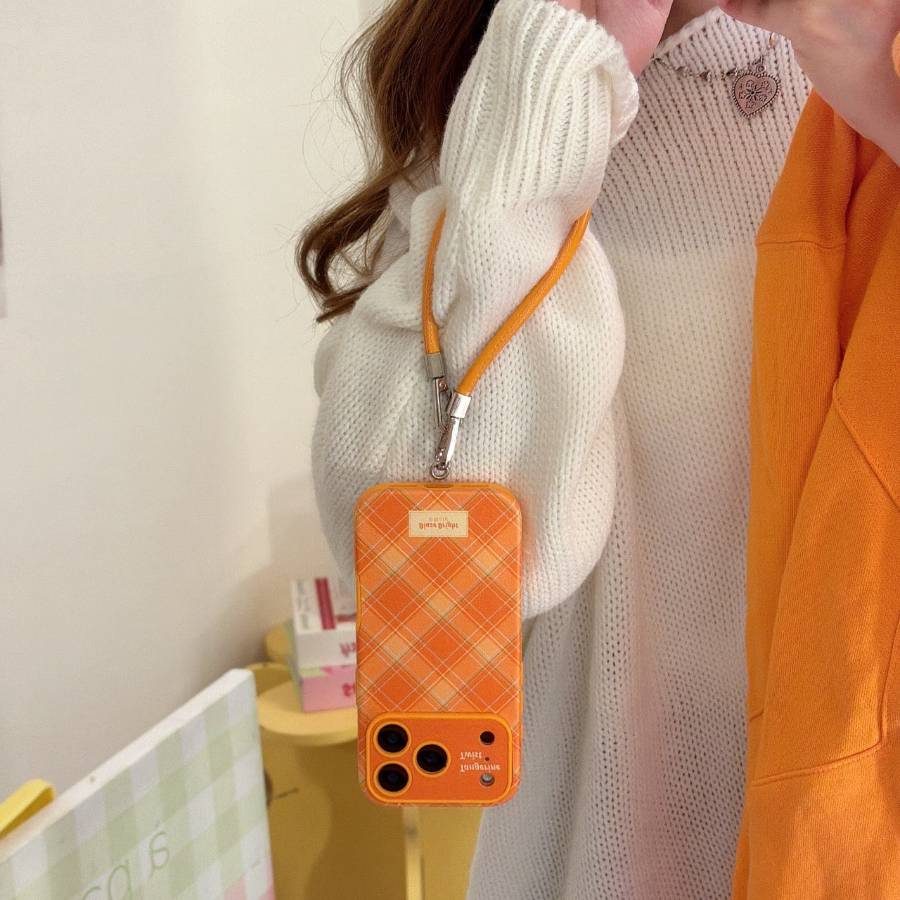 Simple orange diamond pattern large window phone case