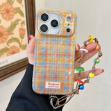 Load image into Gallery viewer, Purple and green checkered phone case with charm