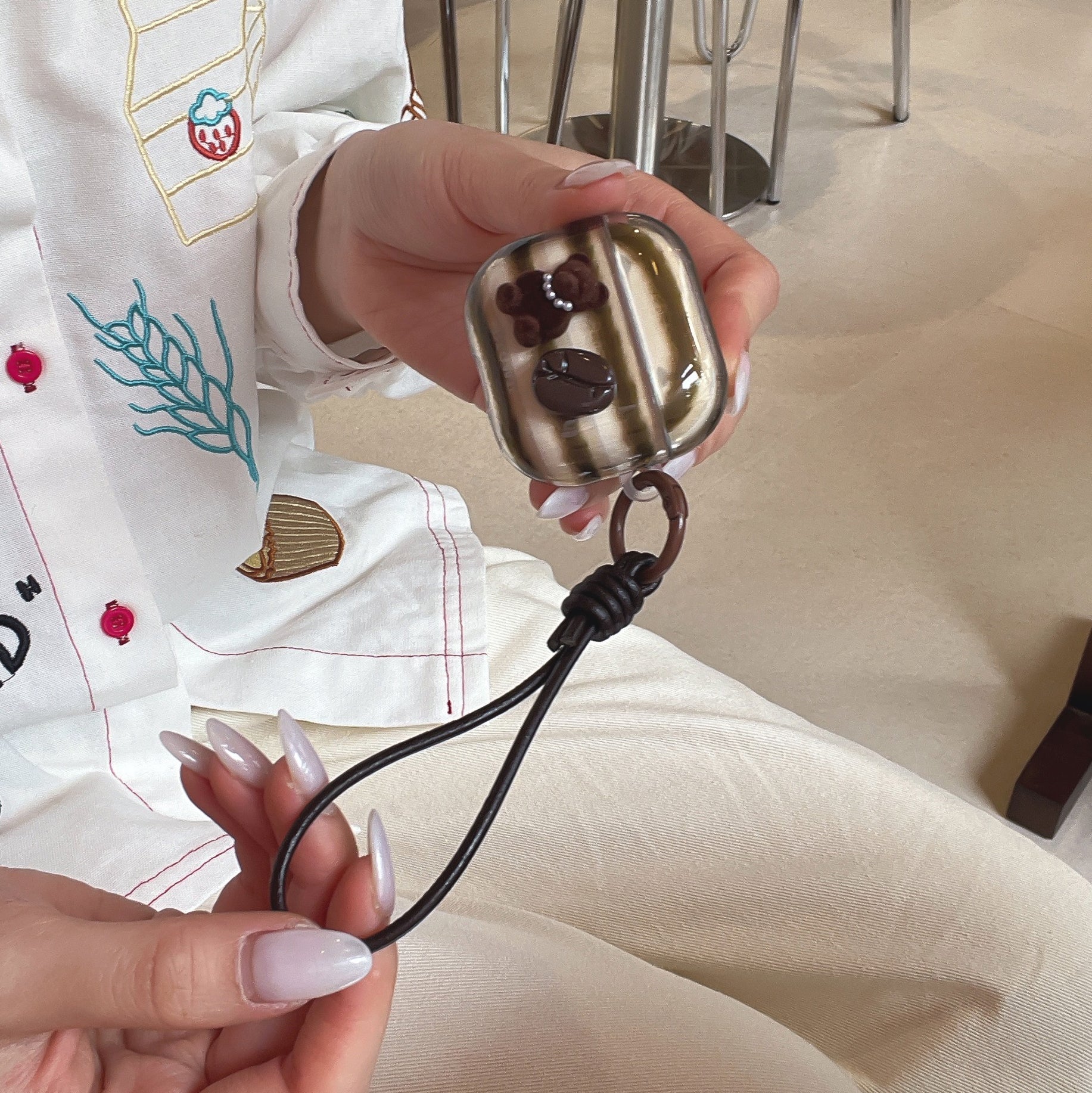 Retro striped coffee bean bear earphone case