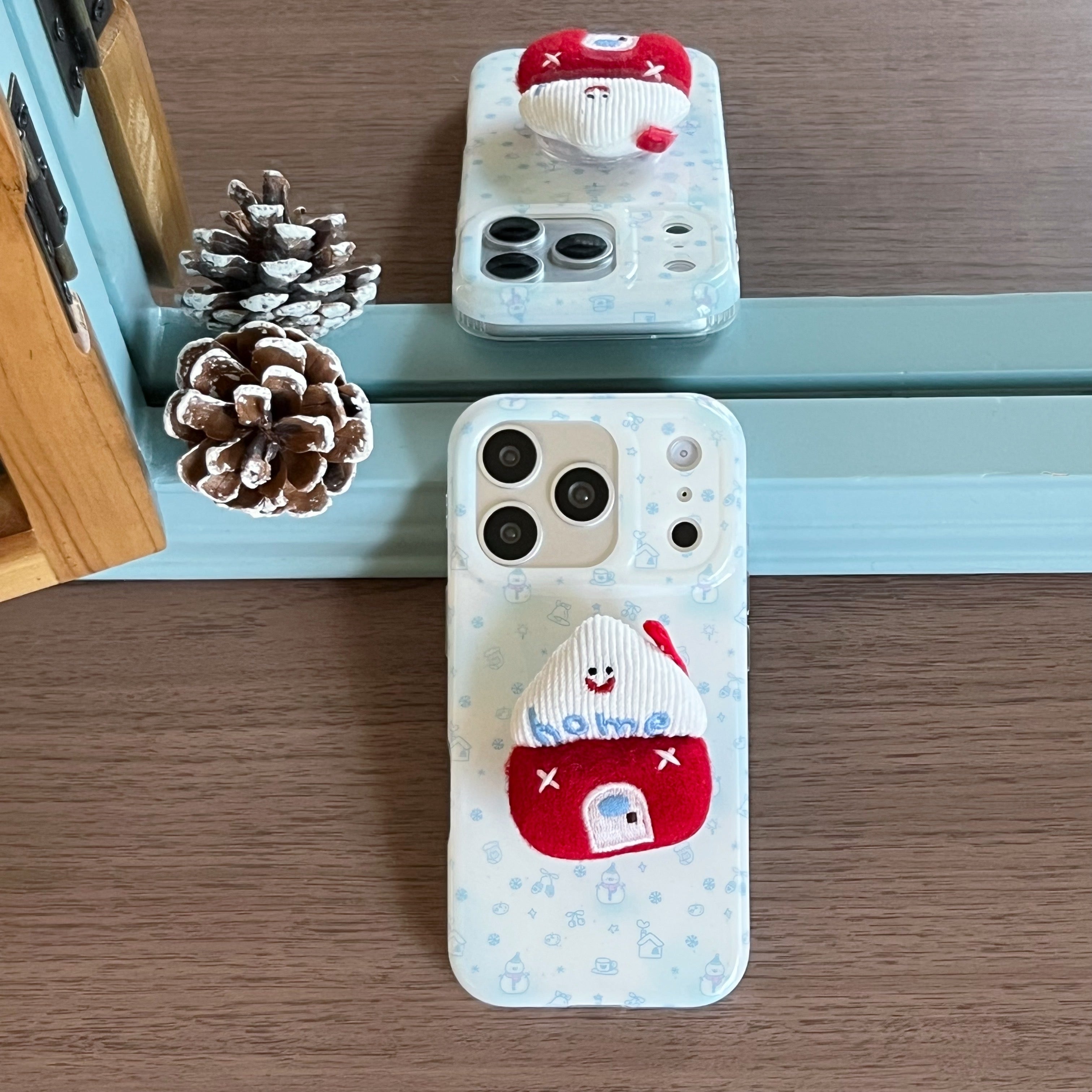 Blue-tinted winter snowman house phone case