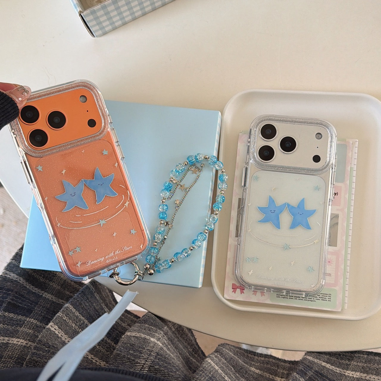 Two dancing blue star rounded phone cases