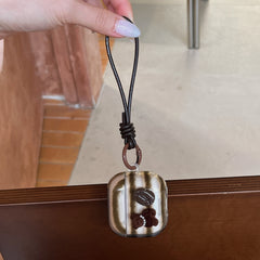 Retro striped coffee bean bear earphone case