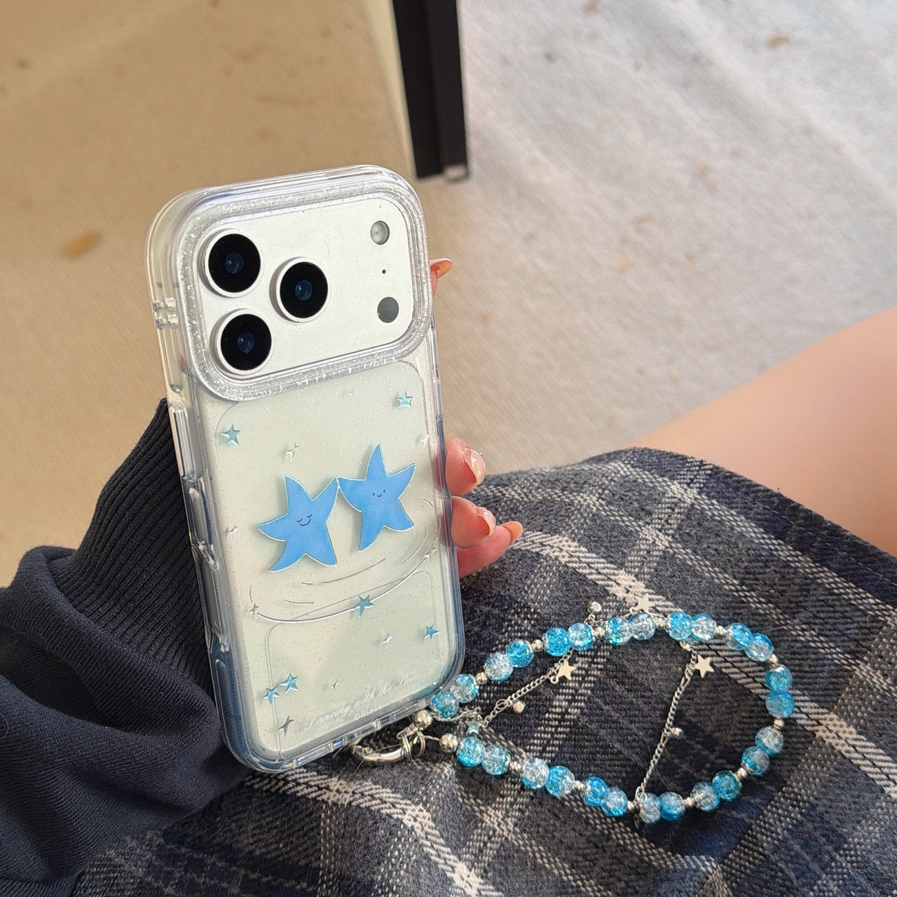 Two dancing blue star rounded phone cases