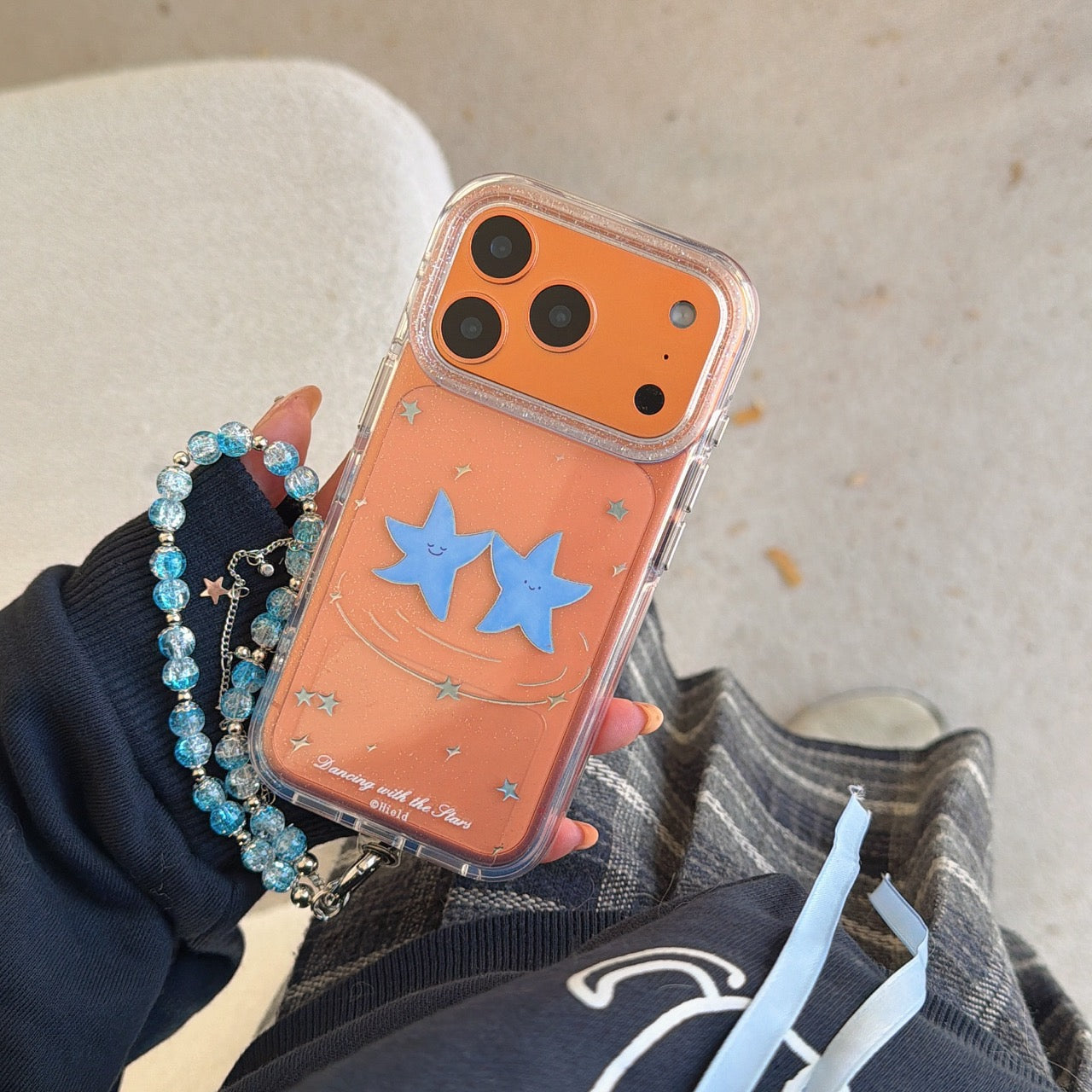 Two dancing blue star rounded phone cases