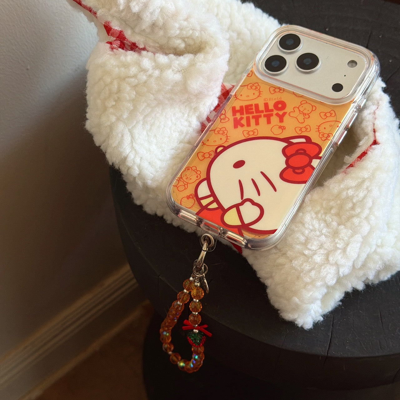 Orange-toned Kitty side profile rounded airbag phone case