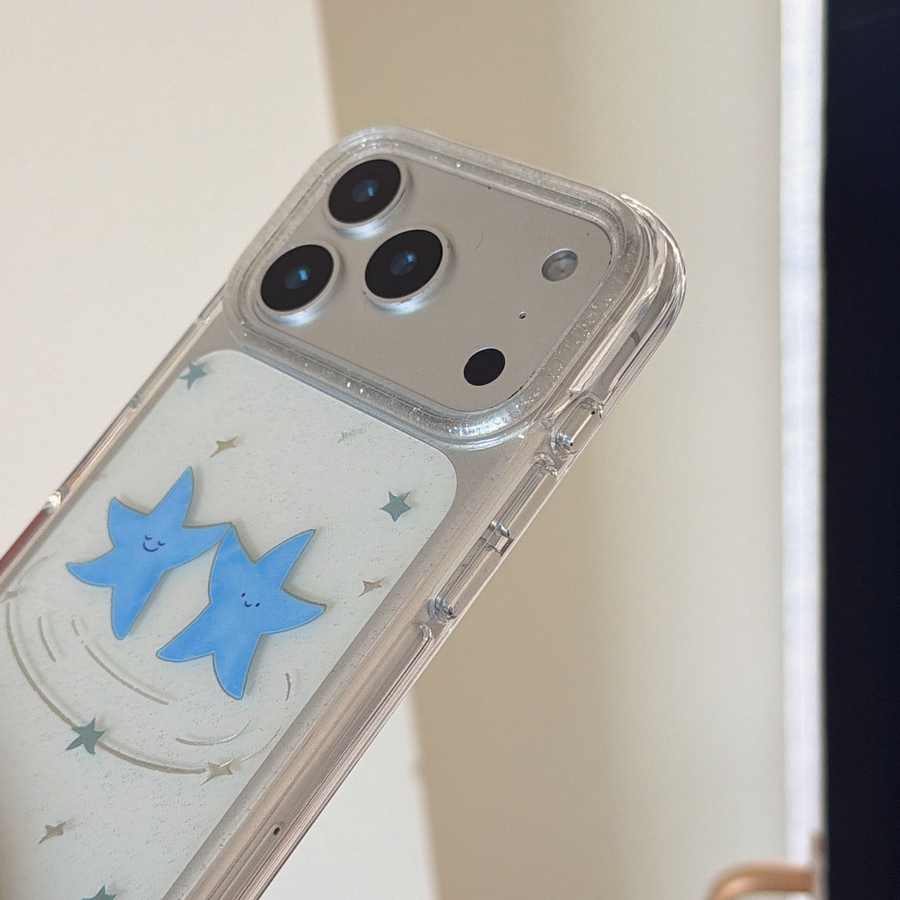 Two dancing blue star rounded phone cases