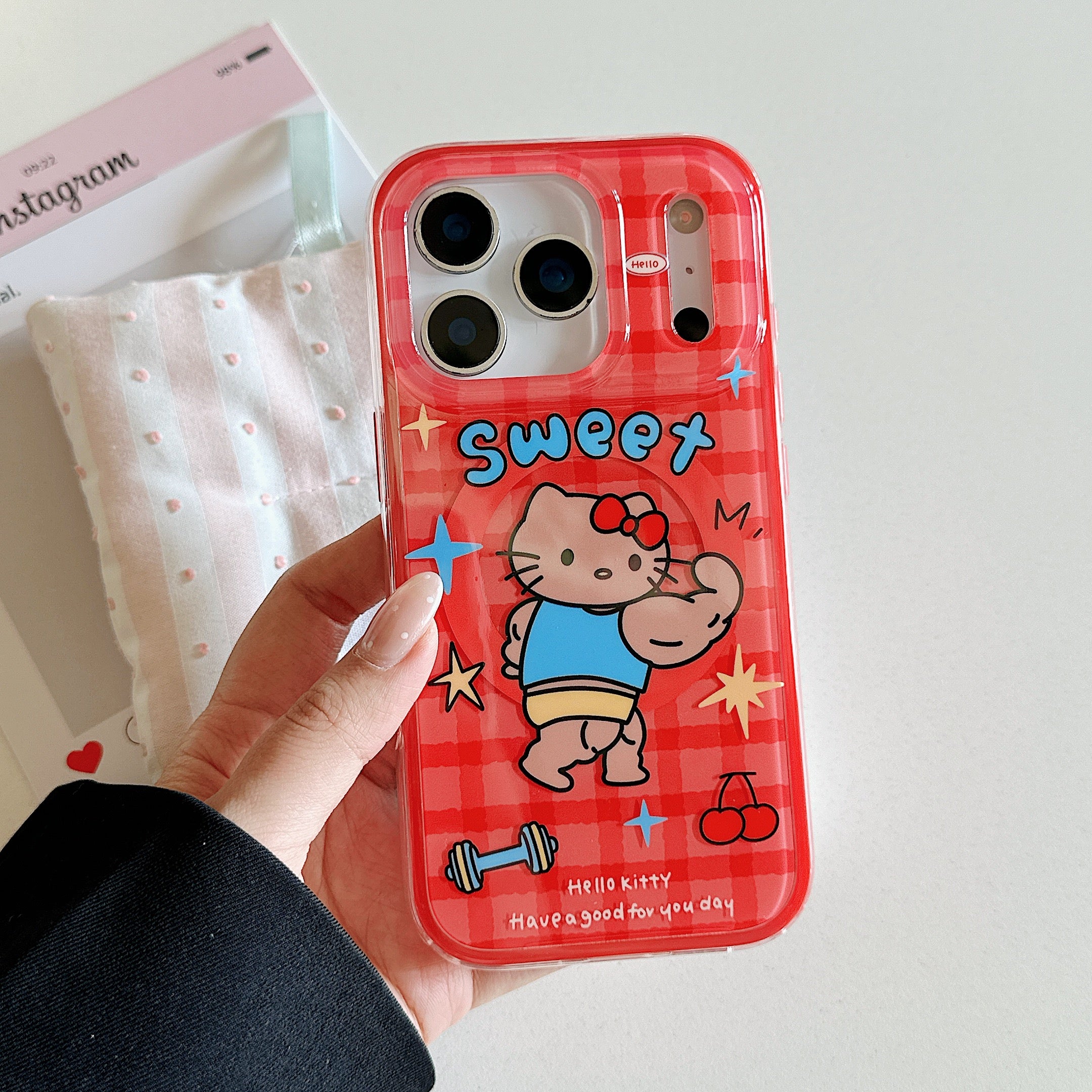 Red plaid Hercules Kitty phone case with magnetic stand