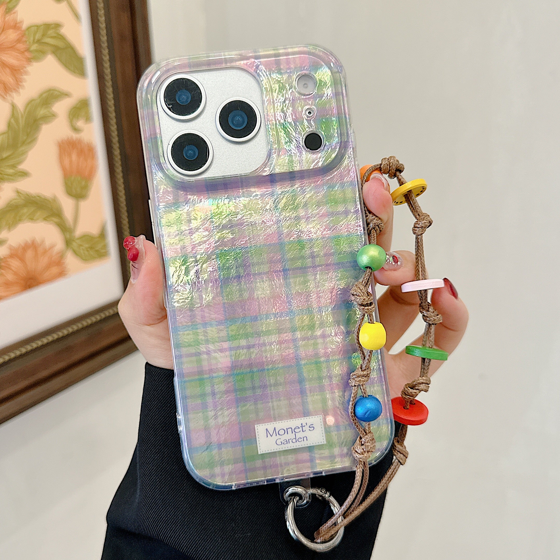 Purple and green checkered phone case with charm