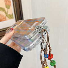 Purple and green checkered phone case with charm