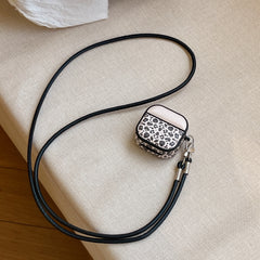 Color-blocked black leopard print magnetic drum-shaped earphone case