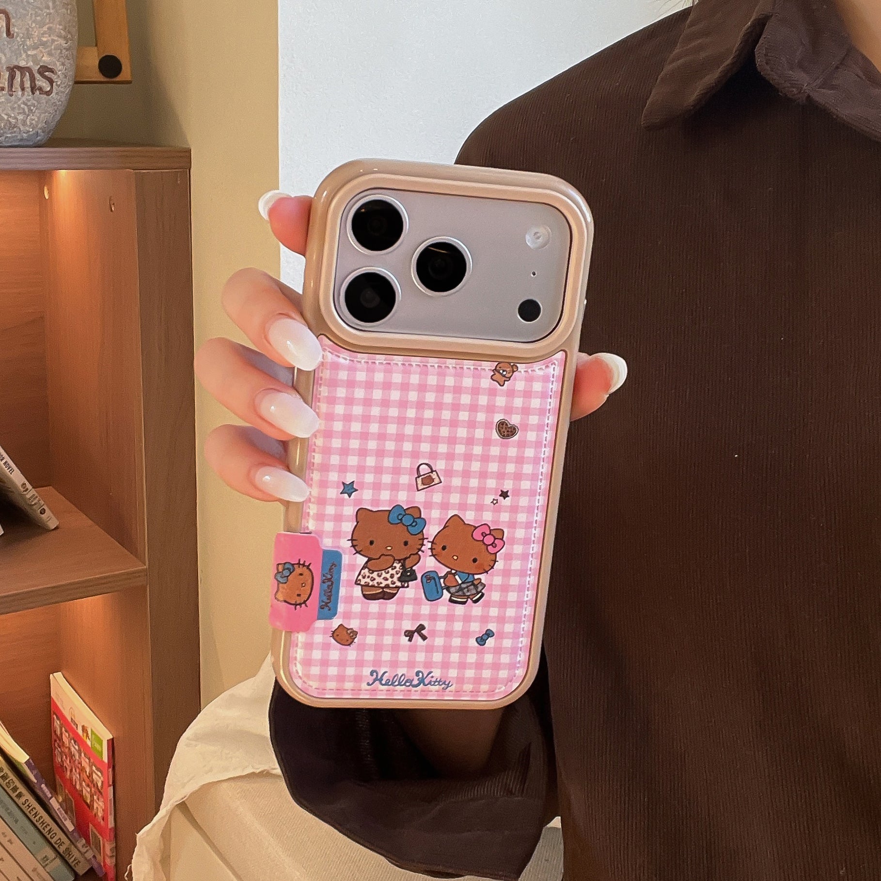 Pink checkered Kitty phone case for iPhone 17