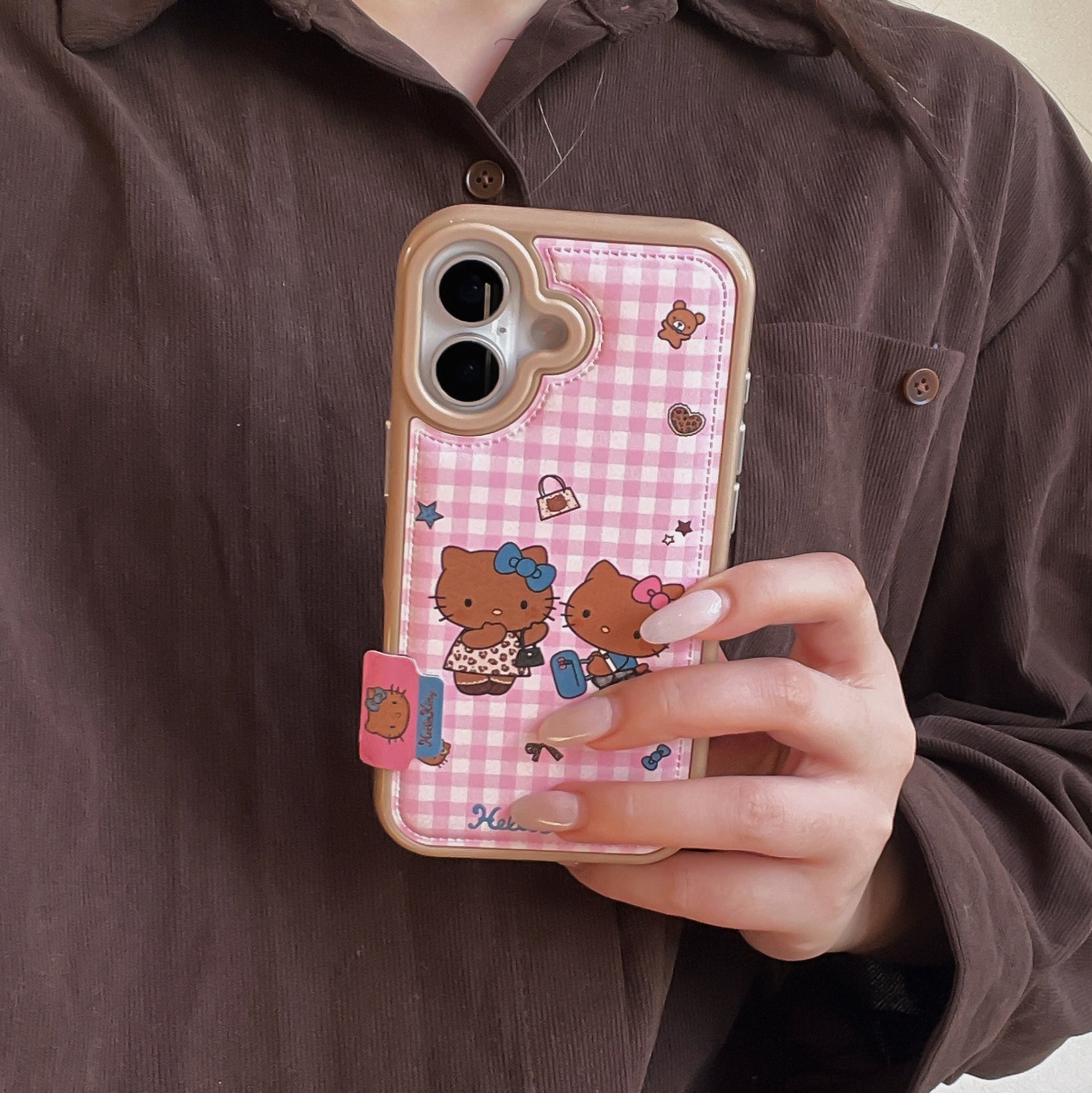 Pink checkered Kitty phone case for iPhone 17