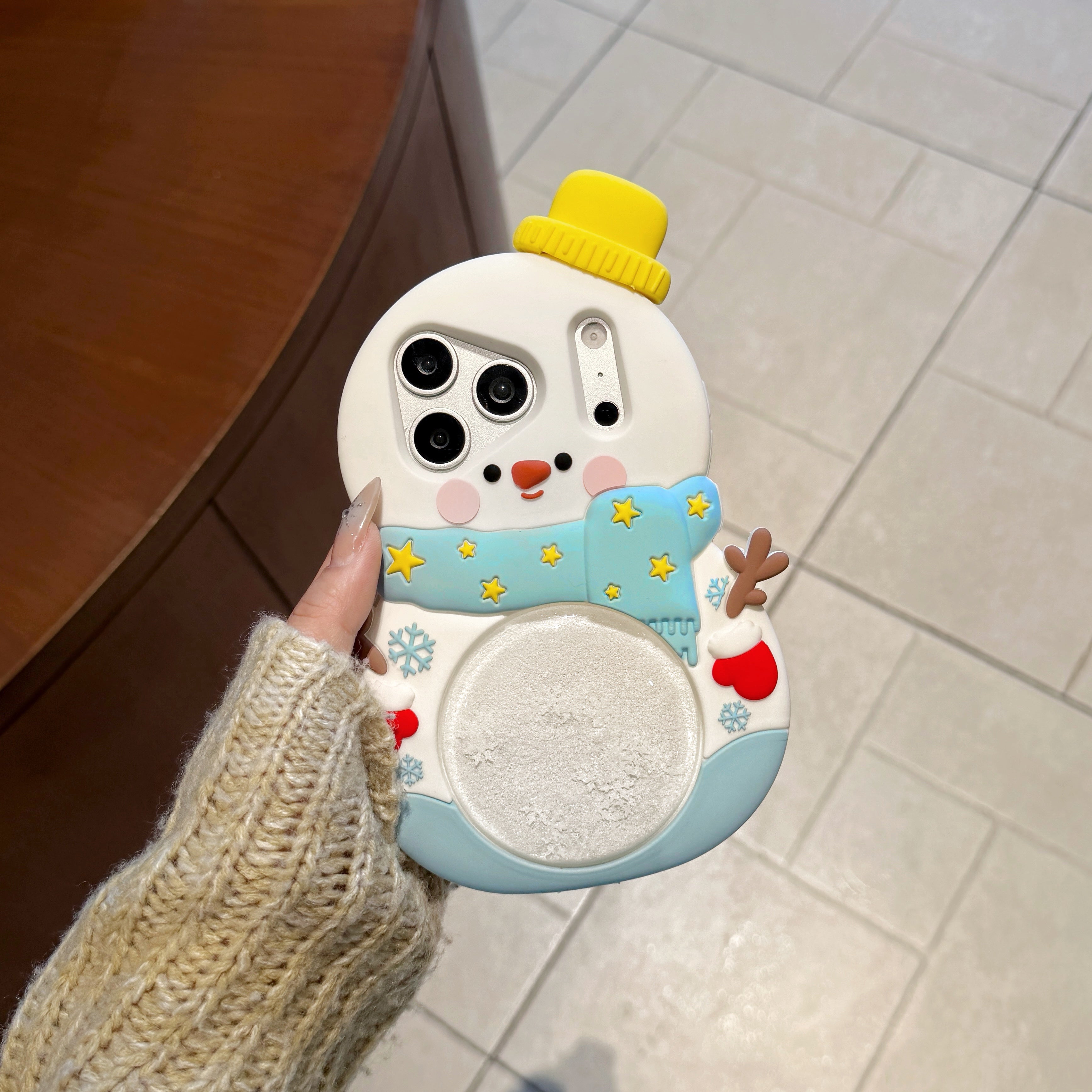 The quicksand snowman silicone phone case is suitable for Apple 17 PRO