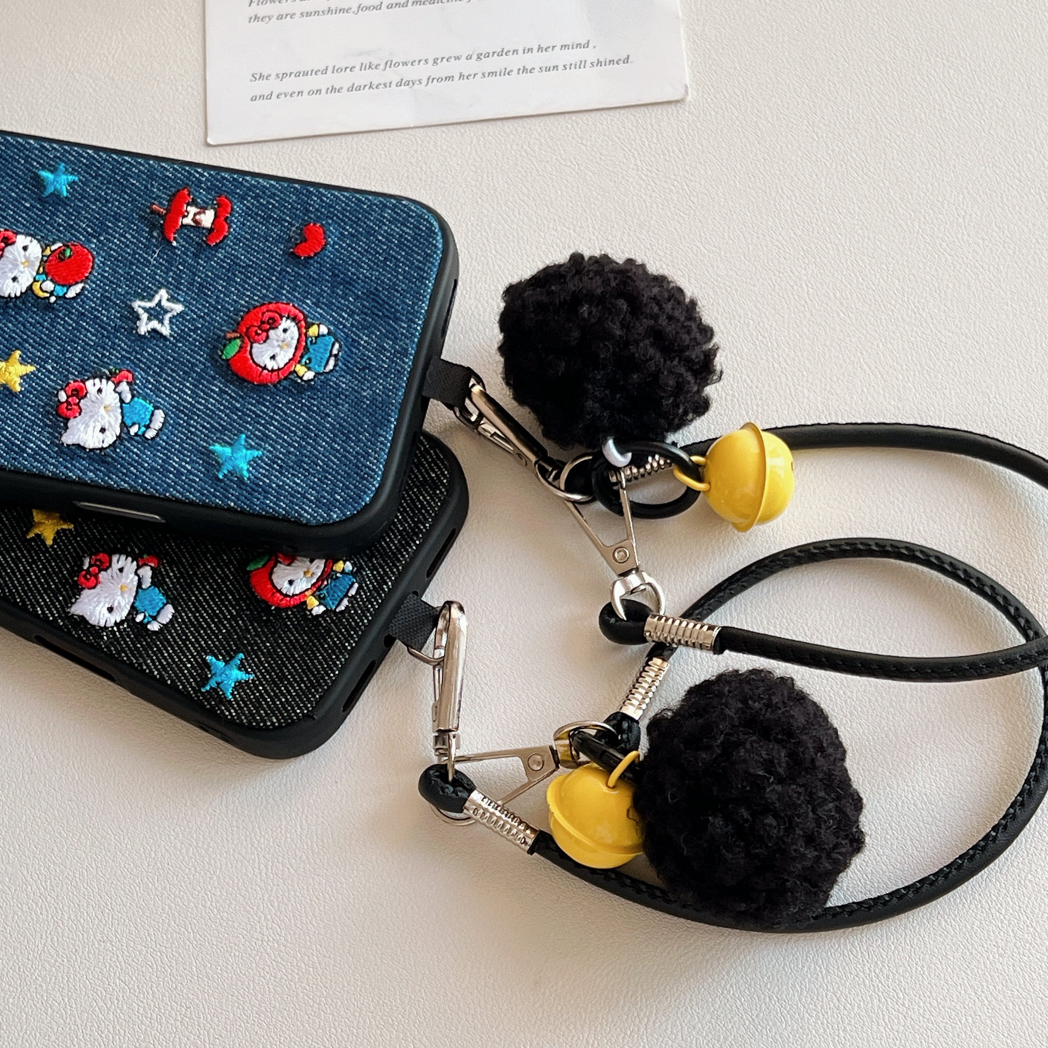 Blue and black Kitty embroidered denim phone case