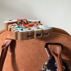 Hollowed-out Christmas cottage silicone phone case