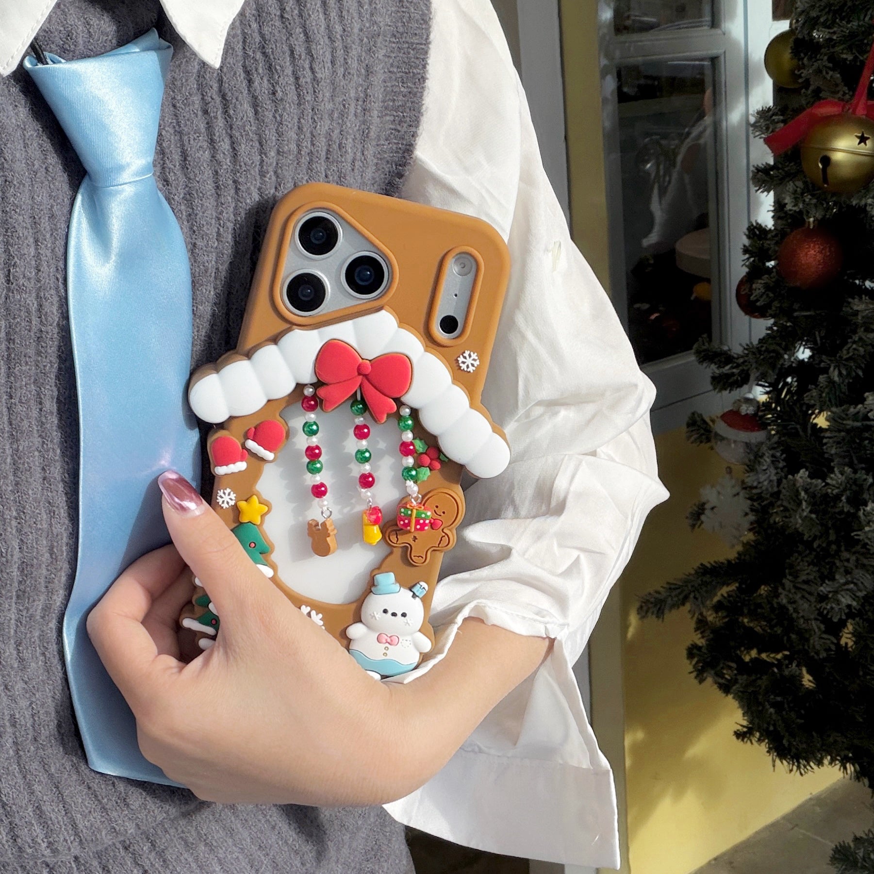 Hollowed-out Christmas cottage silicone phone case