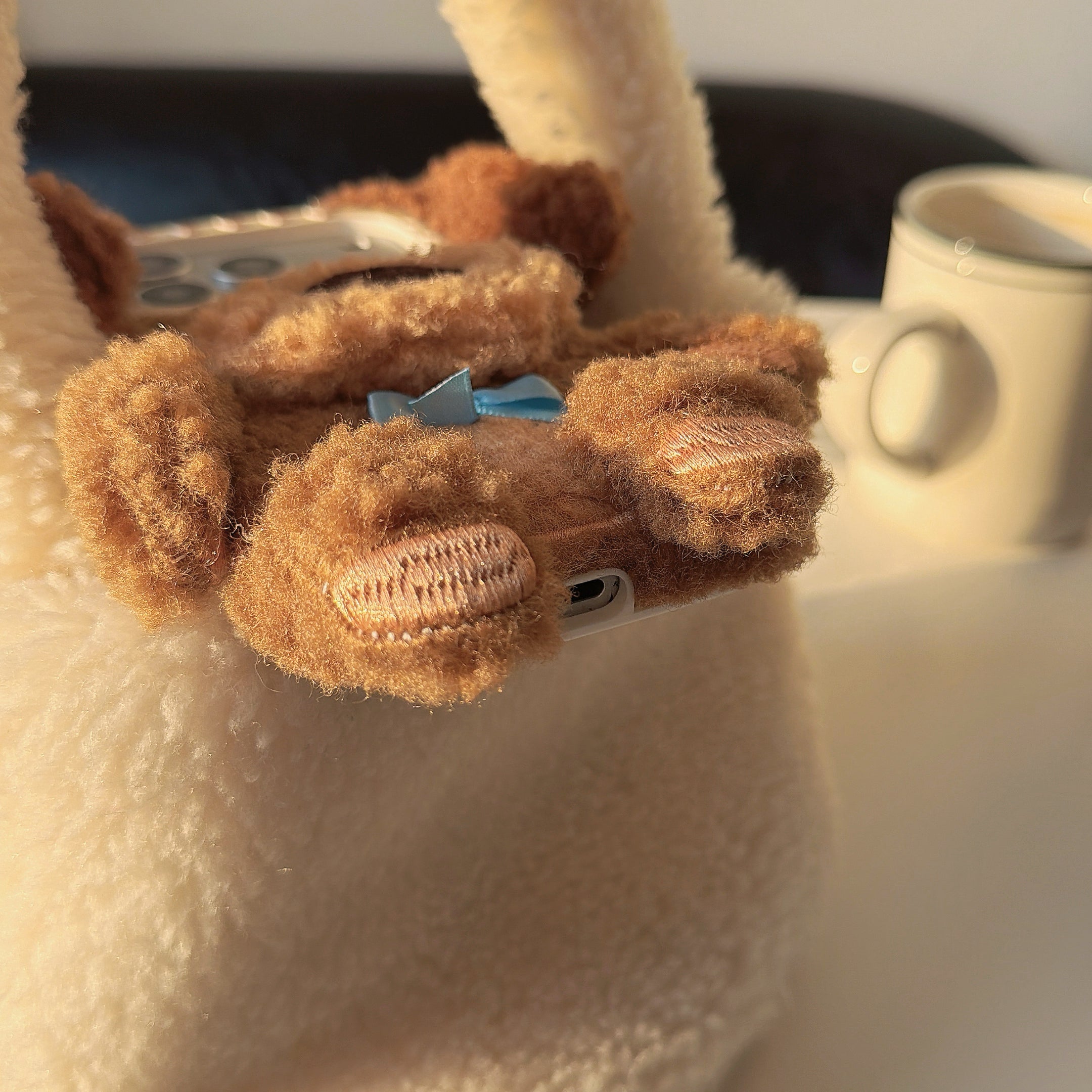 Brown plush puppy iPhone case